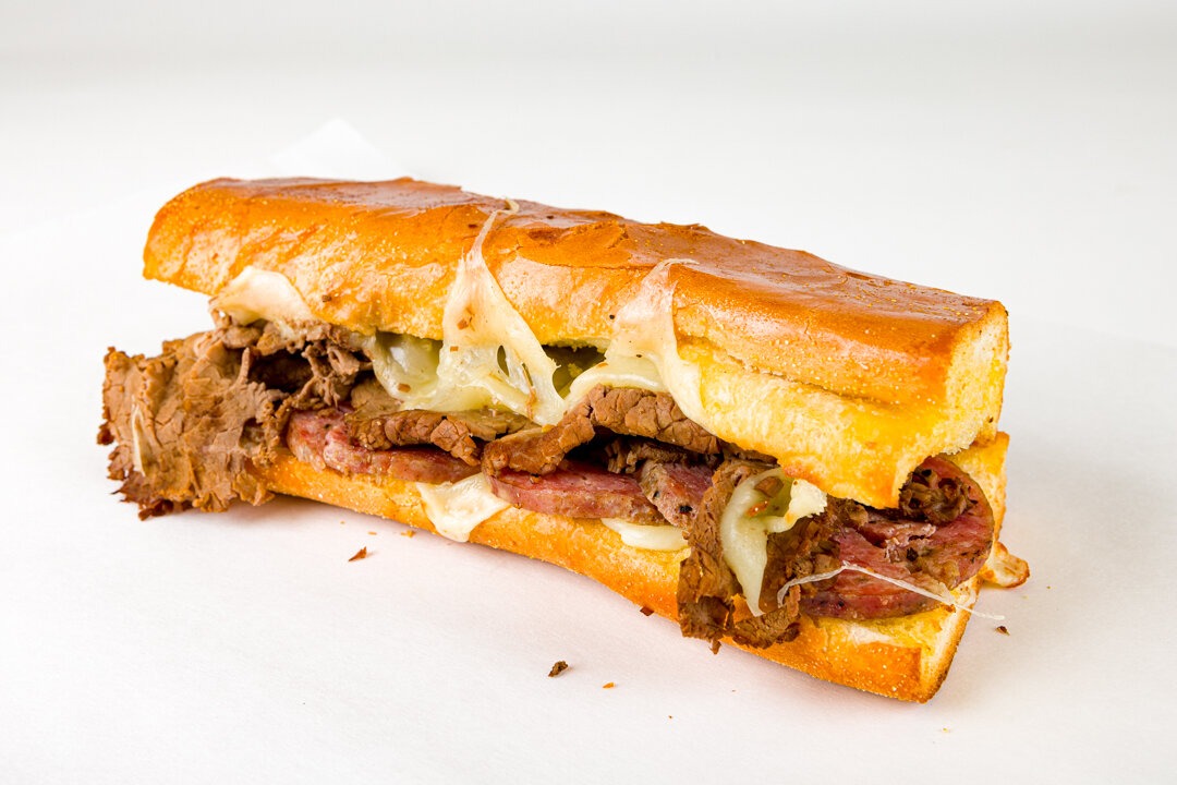 Gioia's Deli signature dishes  Hot Salami Sandwich (made with their unique, house-made salami), Roast Beef Sandwich, Italian Trio, various specialty sandwiches.